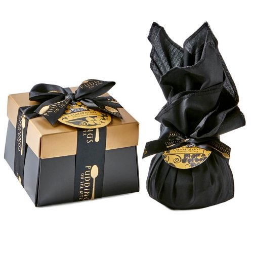 Christmas puddings in gift boxes and clioth